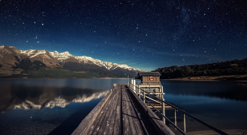 black, galaxy, sky, moonlit, lake, tranquility, beauty in nature, mountain, reflection, tranquil scene, astrology, Mountains, milky way, wood - material