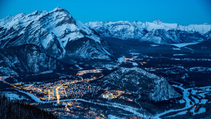 cyan, mountain range, lights, summit, forest, illuminated, tranquility, snow, beauty in nature, nature, skyline, snowcapped mountain, scenics - nature