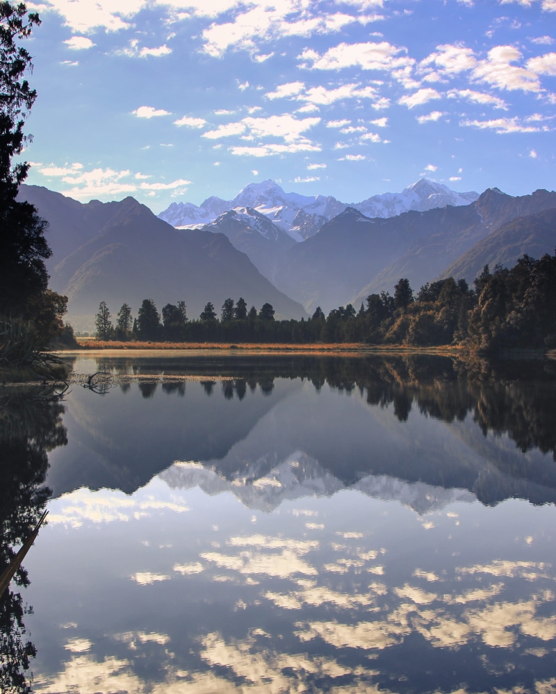 snow, glacier, lake matheson, tree, waterfront, no people, mirror, new zealand, peaks, reflection lake, mountain, water, mountains, 2K, day, beauty in nature