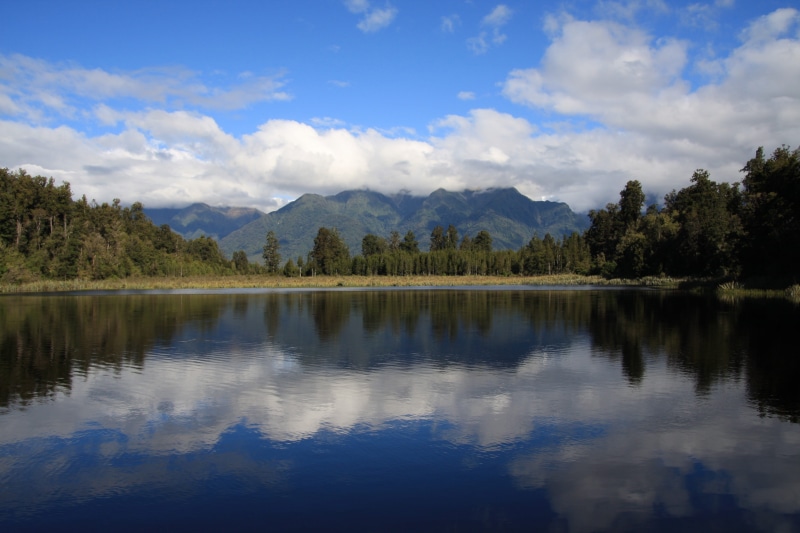 lake matheson, 4K, water, beauty in nature, tree, tranquil scene, mountains, waters, lake, tranquility, sky, reflection lake, plant, idyllic, nature, reflection