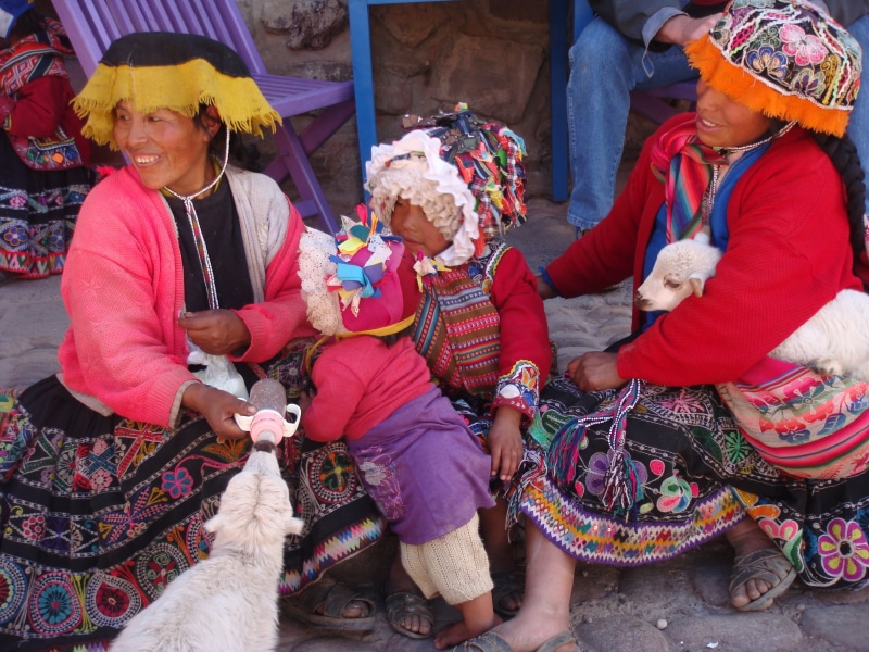 sacred, concrete, adult, cultures, smiling, Cuzco, white, group of people, Photography, sitting, valley, pavement, clothing, family, togetherness, traditional clothing