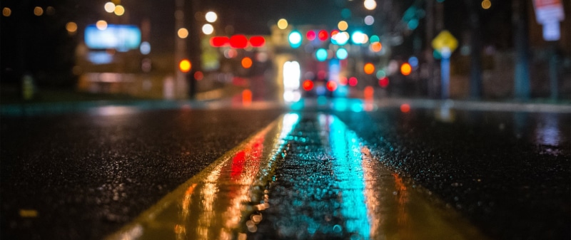 traffic, surface level, city life, 2K, rain, architecture, ultra wide photography depth of field, city, water, outdoors, rainy season, illuminated, street