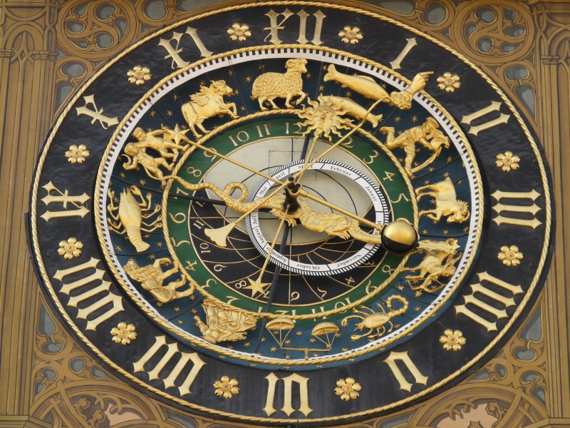 town hall, astronomical clock, brown, day, astronomy, time of, zodiac ring, black, blue, time, architecture, history, clock face, building exterior, roman numeral
