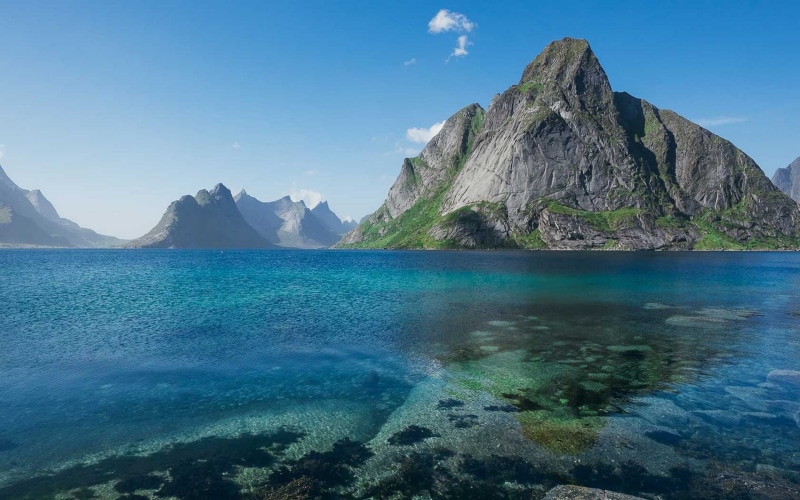 water, mountain range, rock - object, blue, summer, landscape, mountains, rock formation, rock, mountain peak, non-urban scene, beauty in nature, formation
