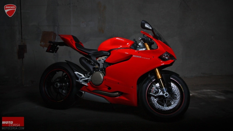 motorsport, motor vehicle, one person, superbike, motion, sports race, crash helmet, side view, sports helmet, land vehicle, indoors, bike, sports, protection