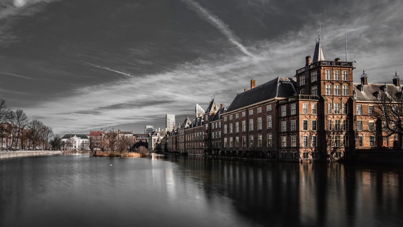 nautical vessel, town, canal, castle, cloud - sky, city, outdoors, spire, nature, metropolis, building exterior, near, steeple, dusk, reflection, architecture