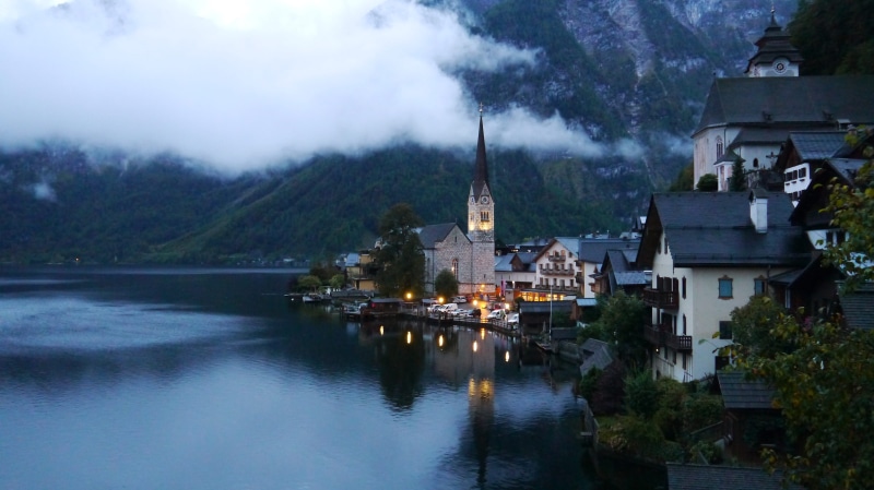 travel destinations, plant, place of worship, land, mountain, hallstatt, scenery, building, water, outdoors, tree, sky, waterfront, belief, religion, hallstate