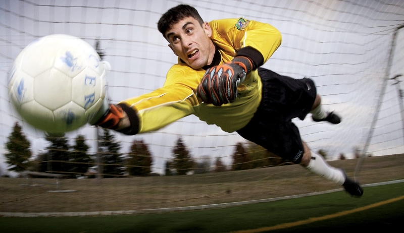 lifestyles, sleeved, shirt, young men, one man only, males, goalkeeper, white, competition, long, yellow, competitive Sport, playing, sports clothing, sport