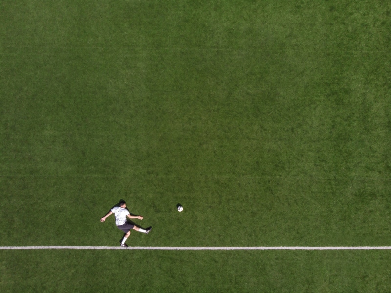stadium, striker, clothing, soccer, league, goal, field, stunning, directly above, green color, athletic, skill, adversary, play, against, adult, acrobatic