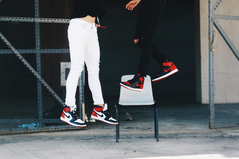 architecture, leisure activity, human body part, shoe, building exterior, human leg, lifestyles, nike shoe, jordan, nike, black, toe, jumping, day, human limb