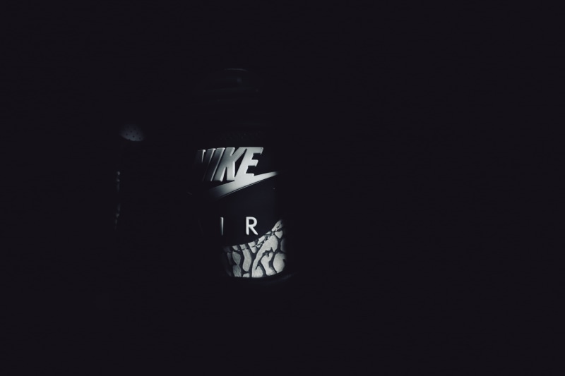 Sneakers, animal, perfume, Jordans, clock, dung beetle, face makeup, bottle, time, indoors, Jordan 3, darkroom, black background, cosmetics, wristwatch