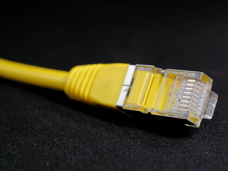 wire, communication, hardware, internet, it, computer science, memory, no people, networking, line, wlan, cork, yellow, black background, transfer, computer cable