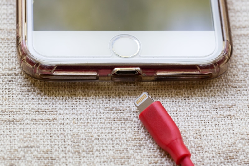 recharge, single object, charge, cell phone cover, screen, iphone, cellular, apple, technology, connector, communication, table, smartphone, wireless technology