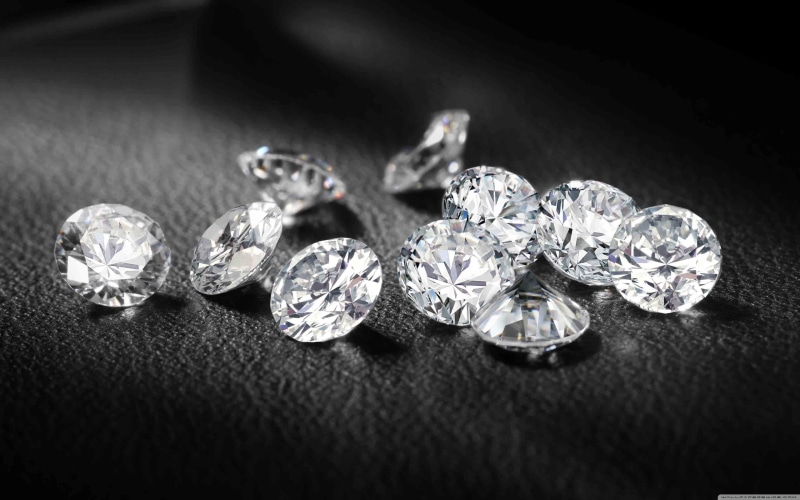 luxury, expense, wealth, jewelry, focus on foreground, group of objects, table, macro, diamonds, fashion, personal accessory, shiny, silver colored, simple background