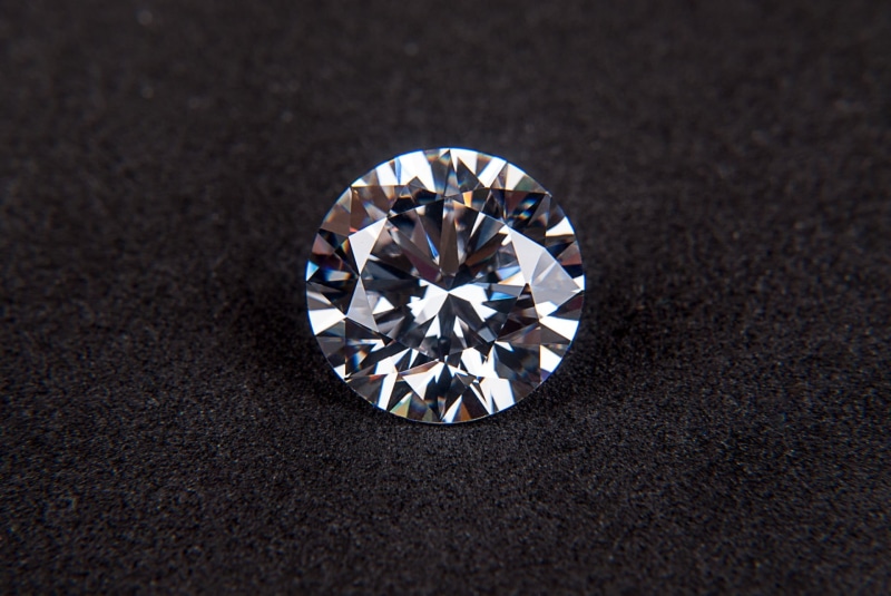 precious Gem, cubic zirconia, gems, rich, fashion, brilliant, cut, symbol, shine, romance, crystal, gift, clear, wealth, shiny, city, circle, high angle view