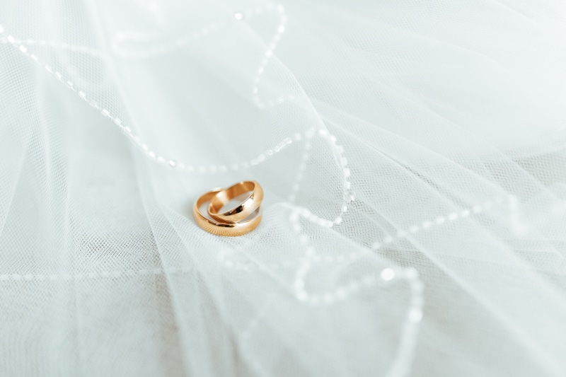 life events, rings, bride, ceremony, elegance, necklace, diamond - gemstone, white, pearl jewelry, indoors, soft focus, purity, fragility, golden, close-up