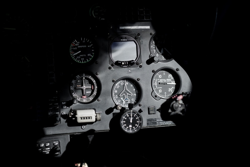 machine part, mode of transportation, control panel, time, transportation, car, aircraft, technology, helicopter, black, watch, black background, cockpit