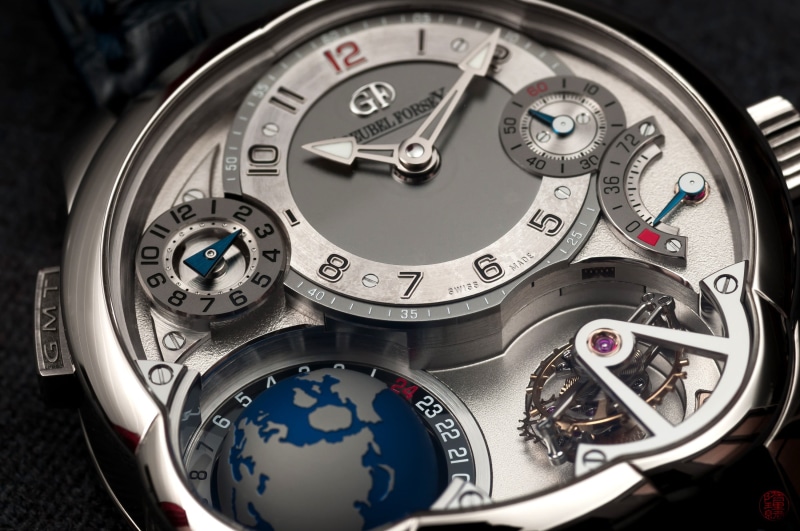 2K, silver colored, wristwatch, high angle view, close-up, still life, Greubel Forsey, technology, number, analog, machinery, complexity, indoors, time