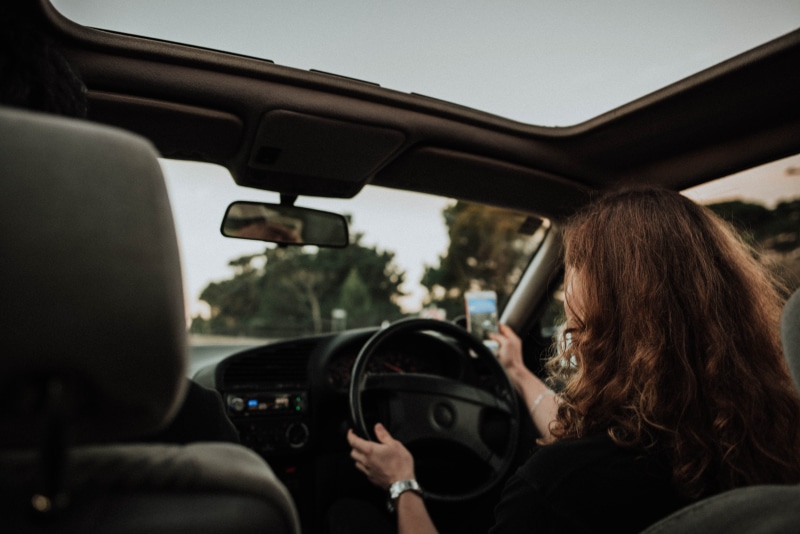 one person, vehicle interior, bokeh, hairstyle, vintagee, aesthetic, indoors, on the move, 5K, rear view, tumblr, sitting, drive, transportation, mode of transportation