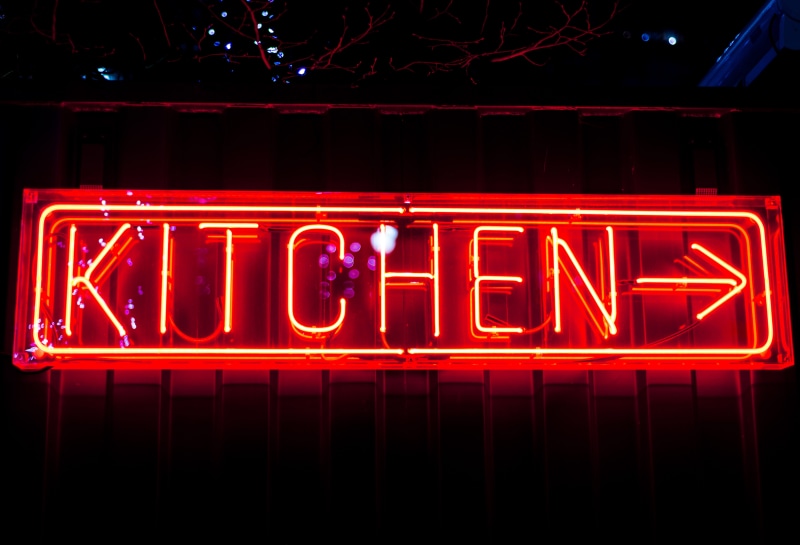 food and drink, neon, coat, text, lighting equipment, architecture, glowing, bird, store, western script, night, clothing, dating, night club, light, outdoors
