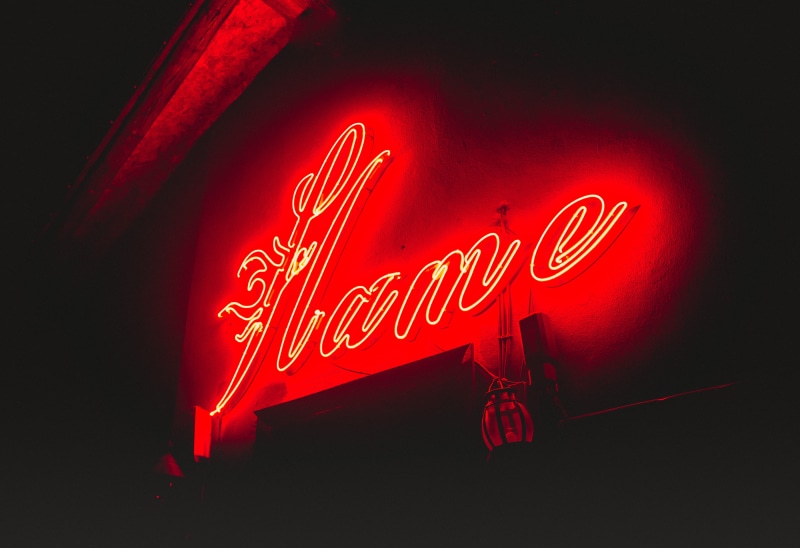commercial sign, information, hood, clothing, text, sign, outdoors, lighting, information sign, red, animal, 4K, illuminated, bird, architecture, bar