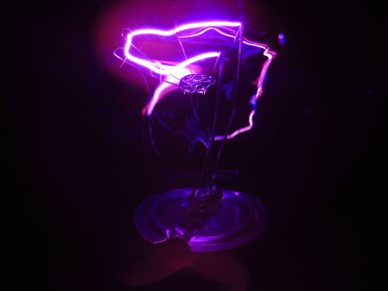 night, hoop, purple, glass, electric light, laser, lighting, illuminated, coil, light, arts culture and entertainment, indoors, neon, pub, money, flare
