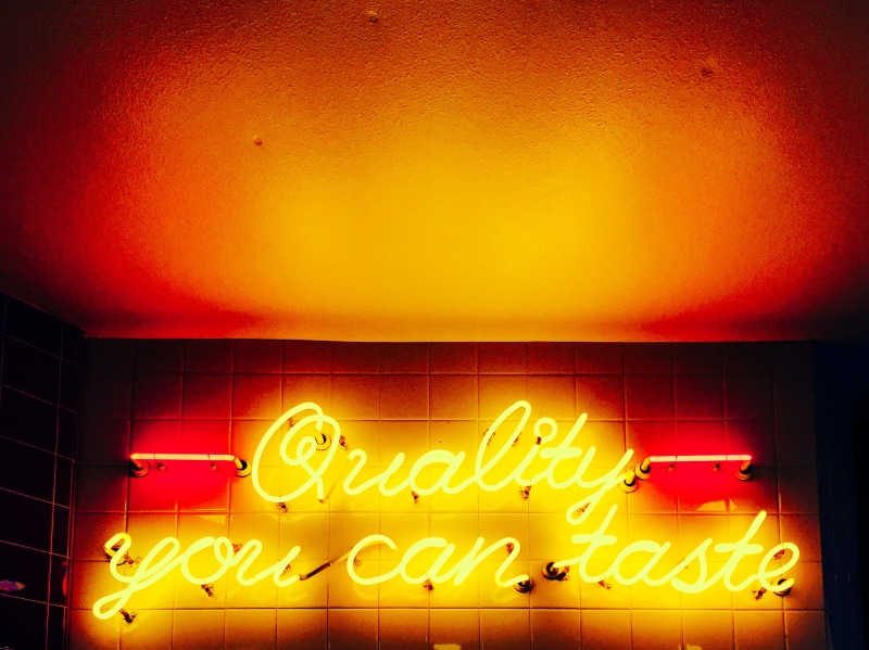 wall - building feature, insect, sign, communication, bee, honey bee, western script, orange color, lightbulb, torch, lab coat, 2K, business, lighting