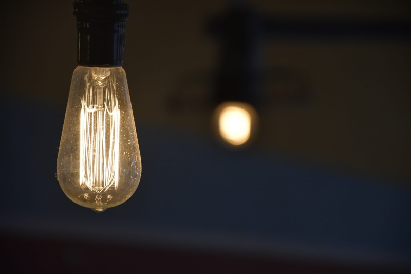 glass - material, light, neon, hanging, coat, flare, focus on foreground, symbol, glass, bulb, recycling symbol, light bulb, transparent, lab coat, lighting