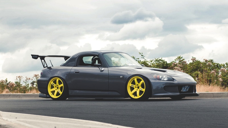 land vehicle, outdoors, transportation, 1080P, mode of transportation, environment, no people, s2000, tree, rear view, motion, sports race, car, road trip