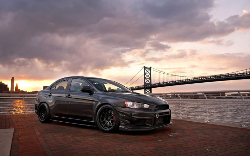 bridge - man made structure, bridge, built structure, vehicle, outdoors, sedan, mode of transportation, city, architecture, travel, nature, Mitsubishi