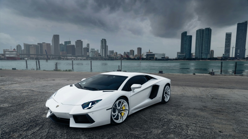 car, landscape, performance car, building, modern, office building exterior, nature, built structure, financial district, tall - high, outdoors, white car