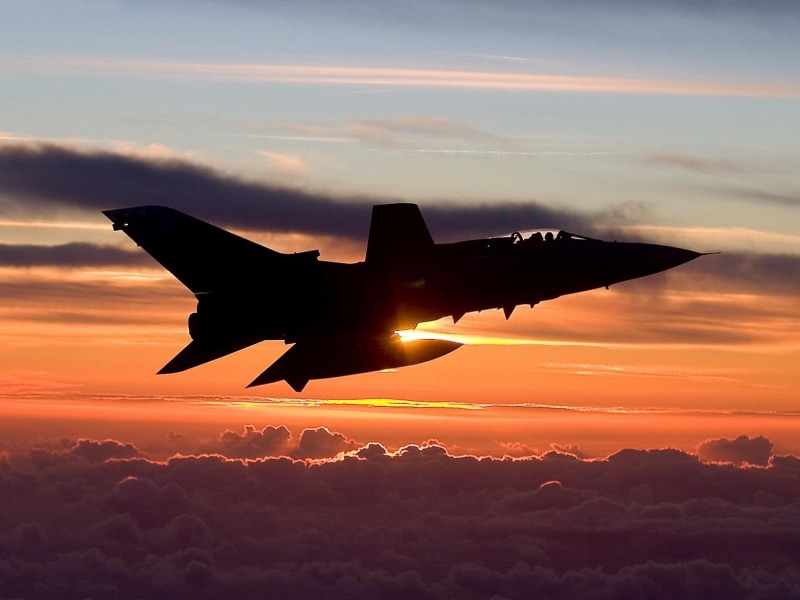 fighter plane, air force, flying, jet, silhouette, jet fighter, mid-air, sunset, sun, outdoors, cloud - sky, military, speed, 720P, mode of transportation
