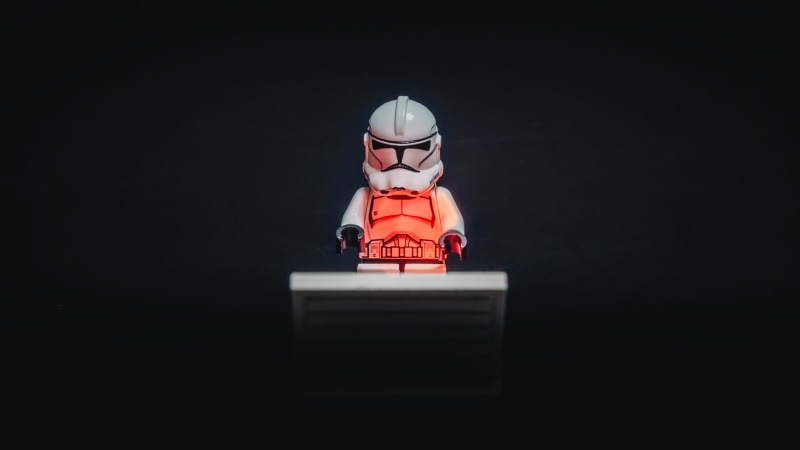 toys, emotion, childhood, child, sitting, headwear, retro styled, copy space, indoors, black background, men, one person, LEGO, fun, protective eyewear
