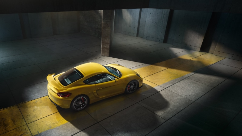 yellow cars, 2K, architecture, travel, mode of transportation, parking garage, motor vehicle, Porsche, transportation, Porsche Cayman GT4, sunlight, garage