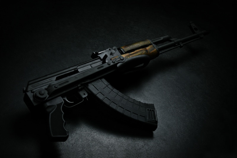 grey black background, assault, temp, handgun, AKMS, 62x39-mm, high angle view, indoors, aggression, metal, weapon, 600 shots, ak, shooting, aiming, protection