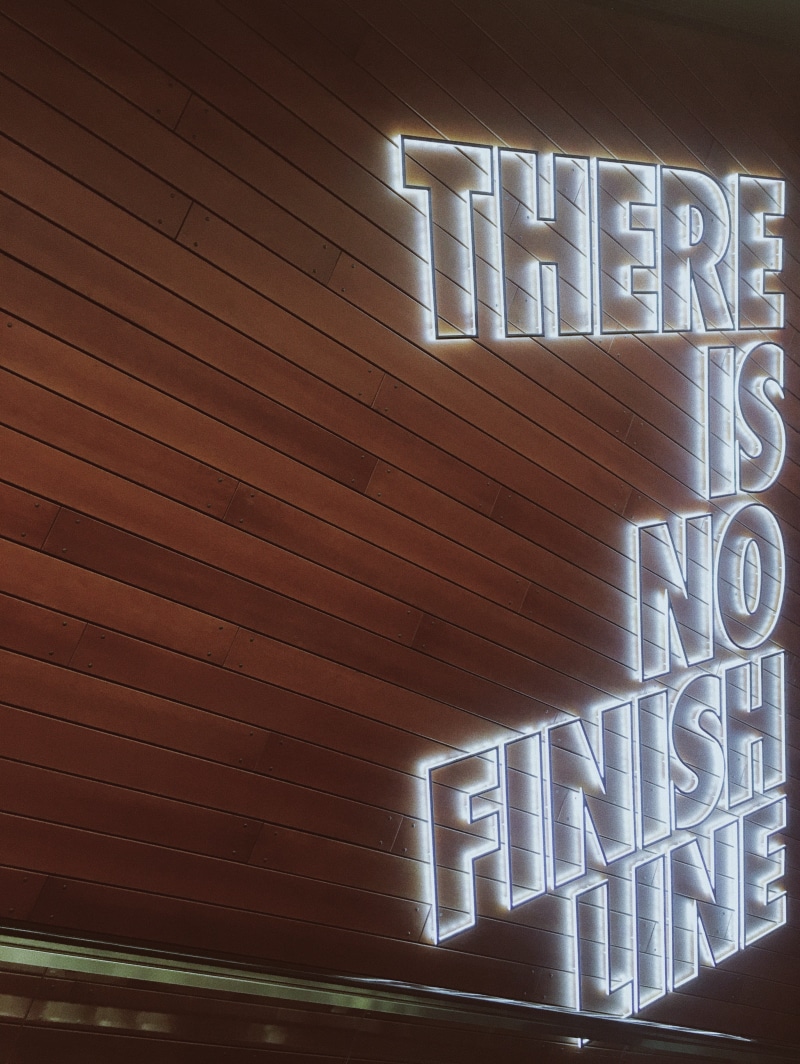text, close-up, communication, illuminated, western script, nike, caesars palace drive, wood, inspiration, sunlight, neon, pattern, built structure, indoors