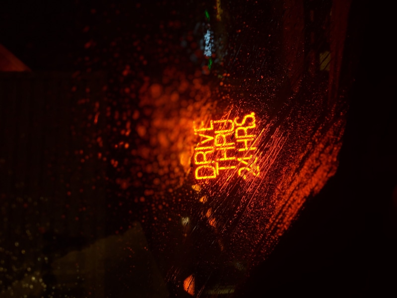 water, thru, night, city, warning sign, indoors, hrs, dark, close-up, sign, capital letter, illuminated, signage, studio shot, neon, nature, wet, black background
