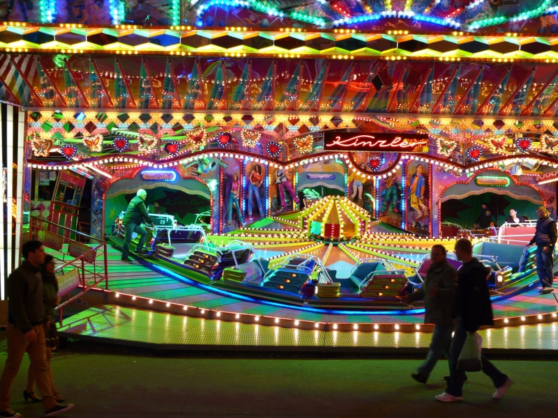women, carousel, men, enjoyment, leisure activity, group of people, festival, colorful, folk festival, neon light, adult, fun, amusement park ride, architecture