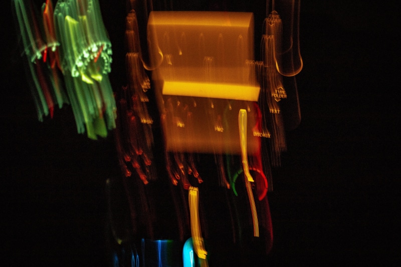 glass, car, illuminated, no people, vibrant, focus on foreground, close-up, in a row, studio shot, colors, technology, yellow, hanging, still life, long exposure