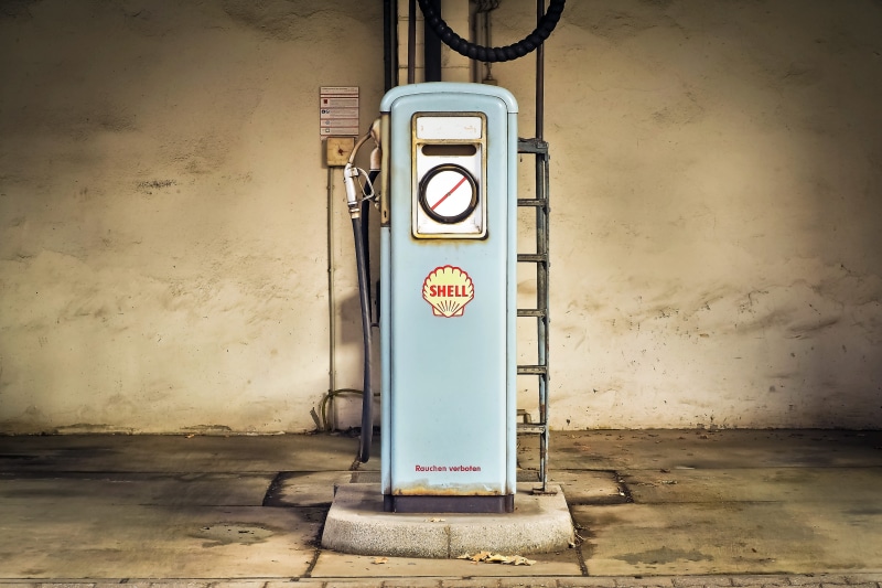 fuel, no people, text, empty, natural gas, outdoors, oil, blue, safety, gasoline, city, wall - building feature, gas, fuel and power generation, old, gas station