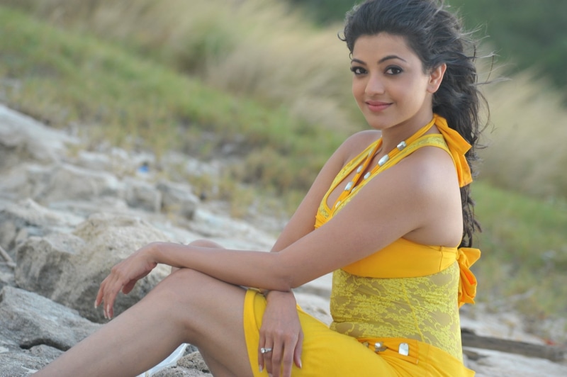 looking at camera, yellow, hairstyle, portrait, focus on foreground, Kajal Agarwal, Kajal Aggarwal, three quarter length, one person, beautiful woman, hair