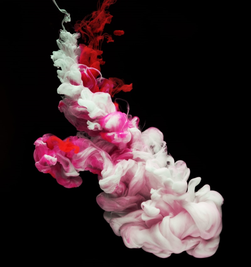 red, flowing, abstract, indoors, beauty in nature, dissolving, cut out, cloud, water, black background, mix, art, close-up, motion, macro, copy space, movement