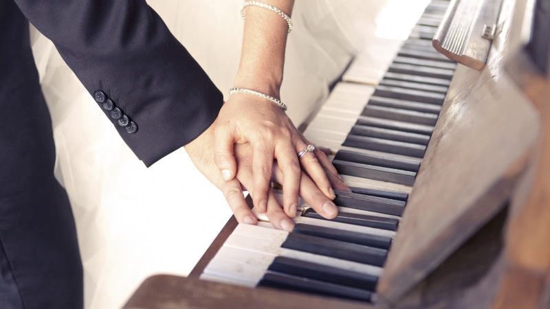arts culture and entertainment, musical equipment, high angle view, hand, musical instrument, togetherness, piano key, men, music, women, adult, hands