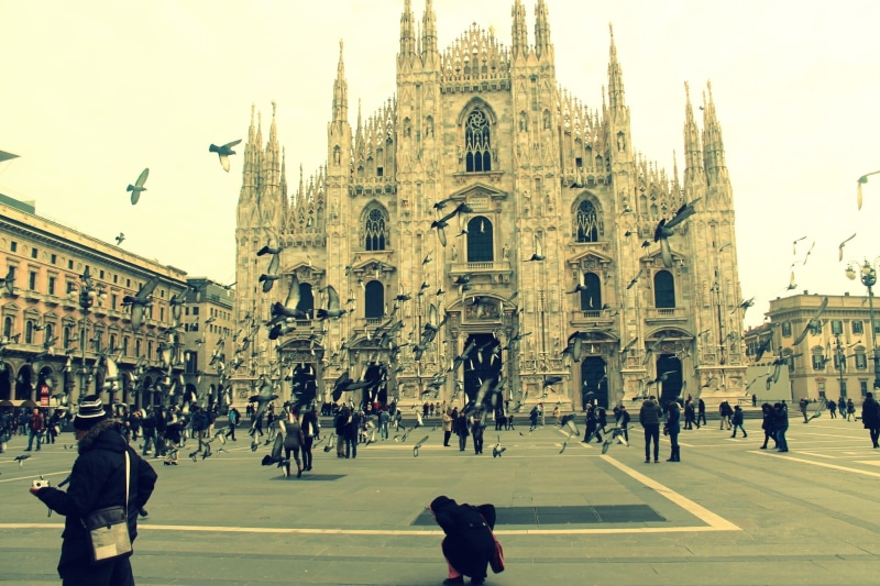 outdoors, place of worship, spirituality, built structure, religion, architecture, old building, group of people, city life, real people, men, crowd, Milan
