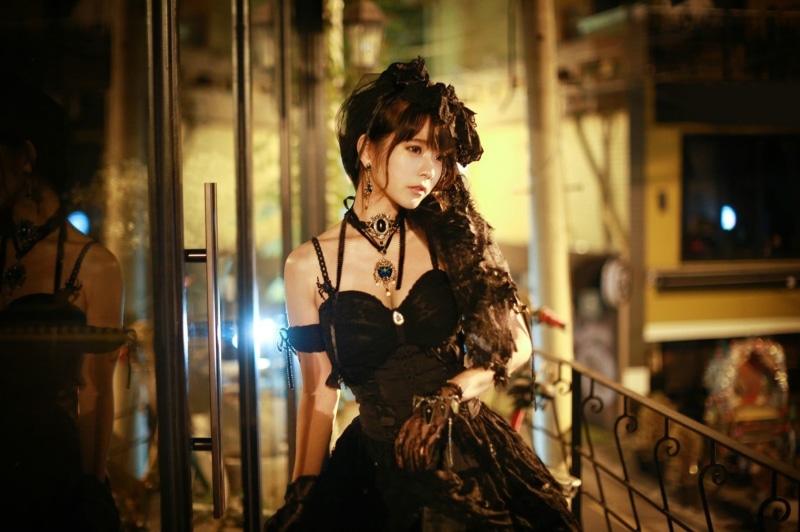 Korean, lifestyles, waist up, three quarter length, Yurisa Chan, indoors, illuminated, black color, beauty, model, dress, standing, one person, sweetheart