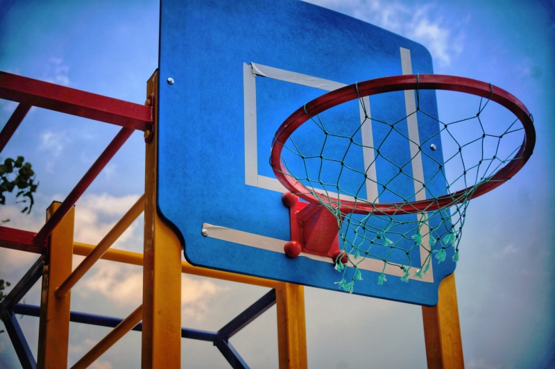red, relaxation, built structure, sport, metal, city, focus on foreground, play, blue, game, shape, basketball, absence, basket, no people, net - sports equipment