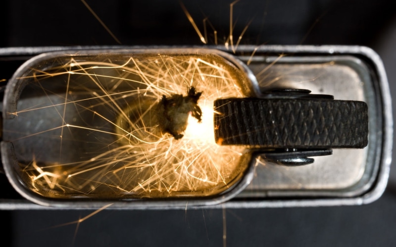 photography, communication, lighter, close-up, breaking, warning sign, transportation, misfortune, zippo, motion, silver, domestic room, burning, emotion