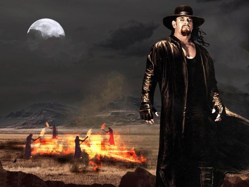 heat - temperature, males, WWE, wrestler, adult, super star, flame, real people, standing, people, dark, night, burning, nature, undertaker, fire - natural phenomenon