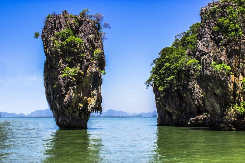 island, tranquility, tranquil scene, sky, waterfront, no people, non-urban scene, idyllic, rock - object, day, beauty in nature, scenics - nature, rock formation