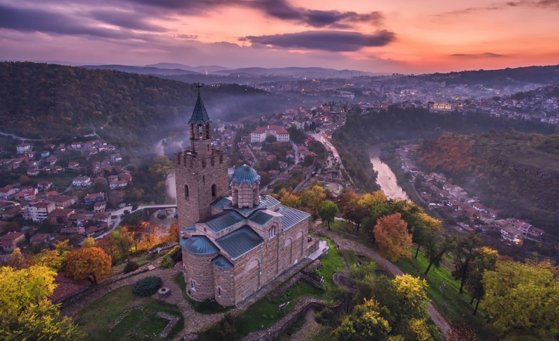 houses, architecture, veliko tarnovo, no people, sky, brown, the river yantra, mountains, church, spirituality, photo, trees, castle, evening, sunset, place of worship